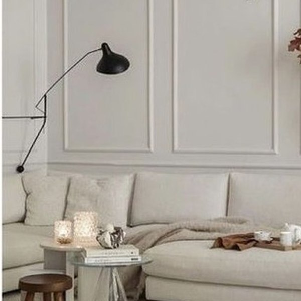 Woonhuis Haarlem II — bank en zwarte lamp interieur Studiomove